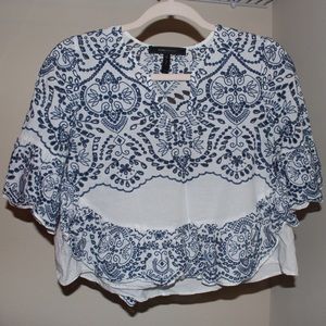 White and blue slightly cropped blouse